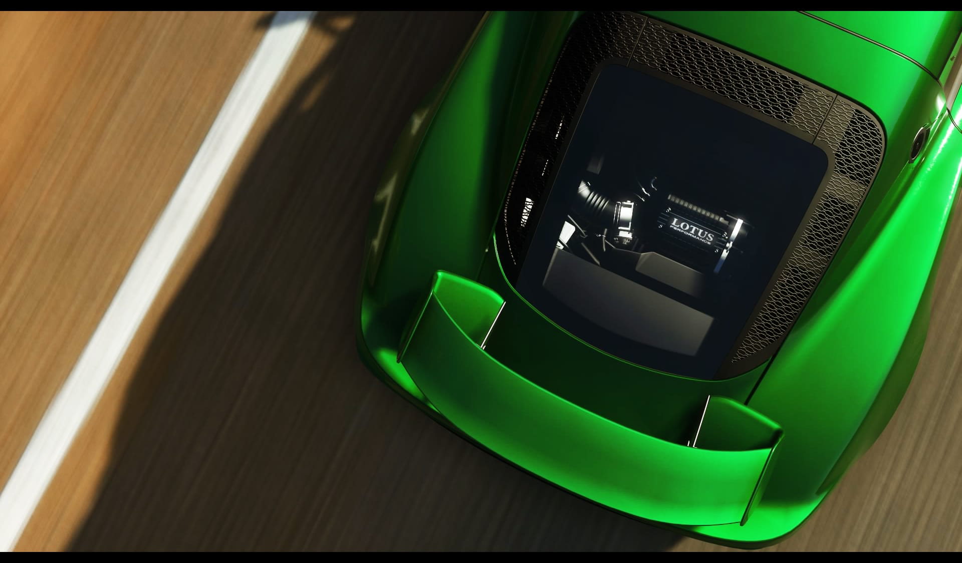 Vue aérienne d’une voiture de sport Lotus verte sur la route.